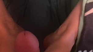 Playing with daddy’s cock with my feet